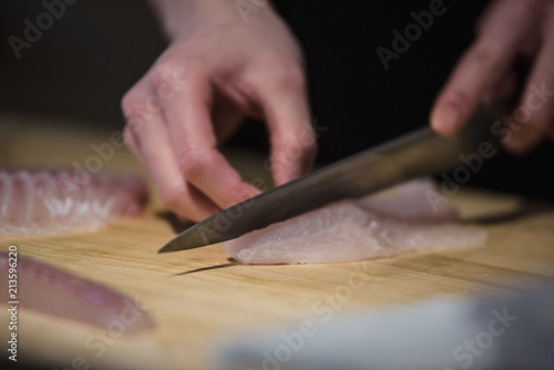 Handwork Slicing Fresh sea food, making sashimi photo