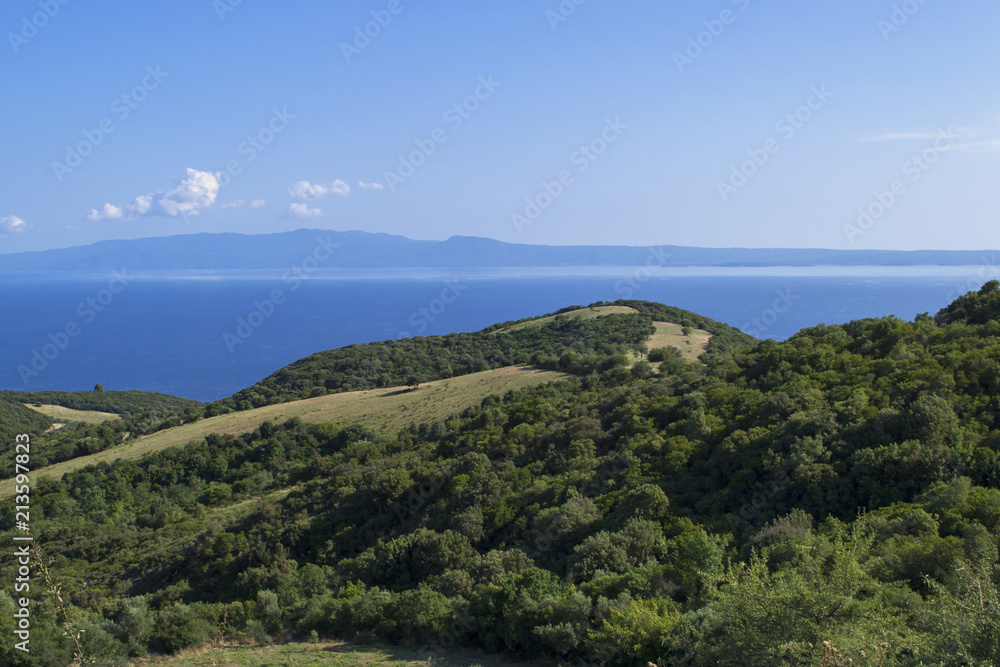 Beautiful summer sea landscape with a view on Sithonia peninsula. Halkidiki, Greece.