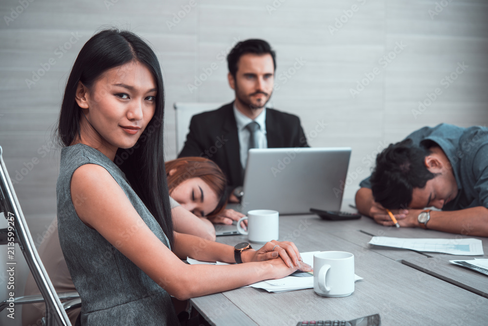 business woman and sleeping resting on workplace during work meeting. business woman and sleeping resting on workplace during work meeting.