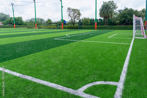 Green artificial grass field,soccer line.