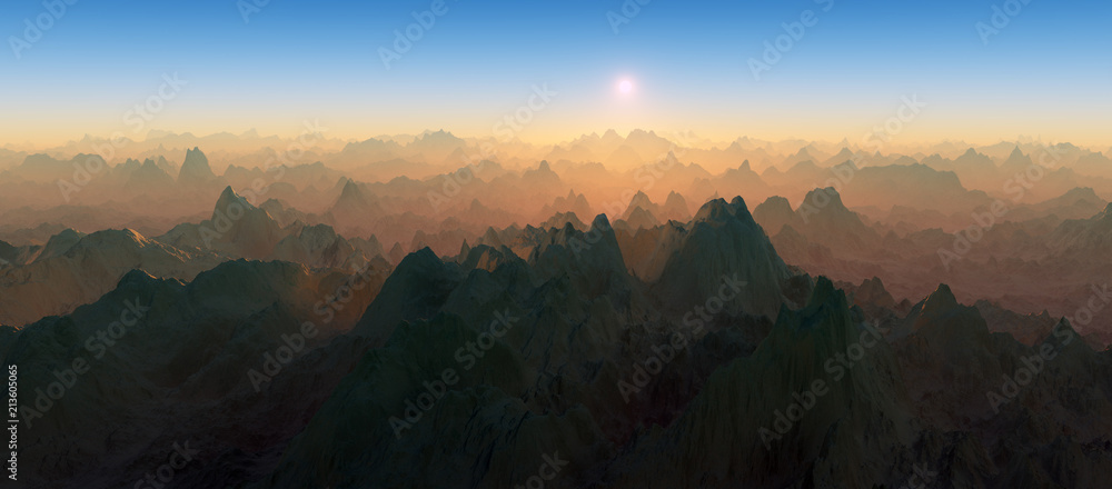 Panoramic view of a remote barren mountain range during sunset