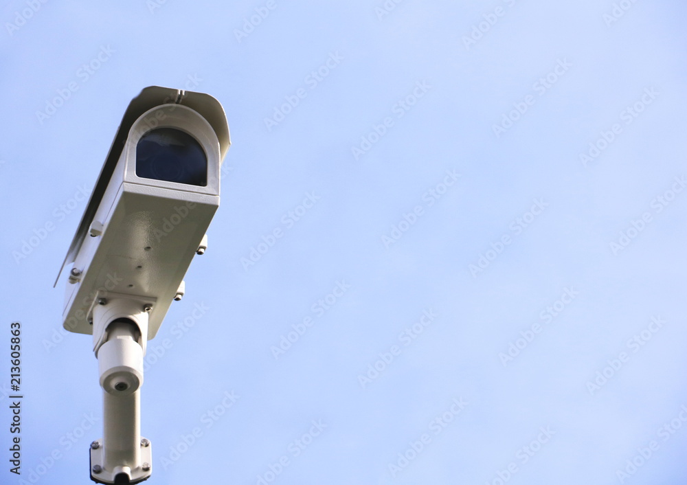 CCTV security camera operating in home. Image of CCTV security camera on white background. CCTV security camera operating in home. Image of CCTV security camera on white background.