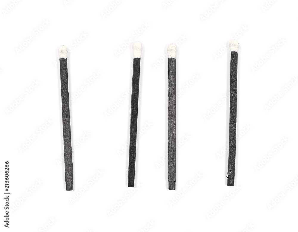 Black matches isolated on white background, top view Black matches isolated on white background, top view