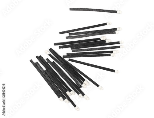 Black matches isolated on white background, top view