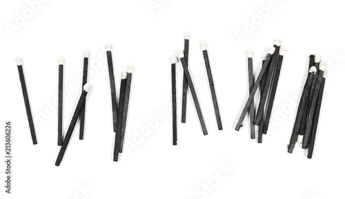 Black matches isolated on white background  top view
