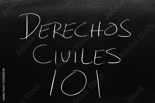 The words Derechos Civiles 101 on a blackboard in chalk.  Translation: Civil Rights 101