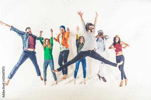 Happy friends jumping