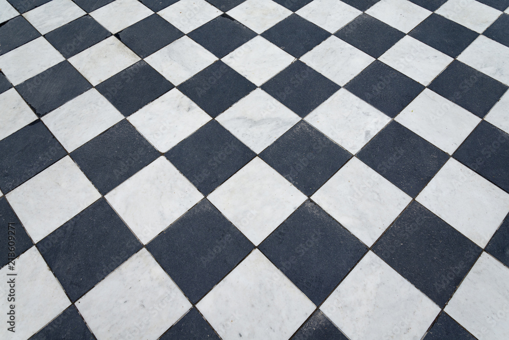 Fototapeta premium Black and white tiles. Chess floor.
