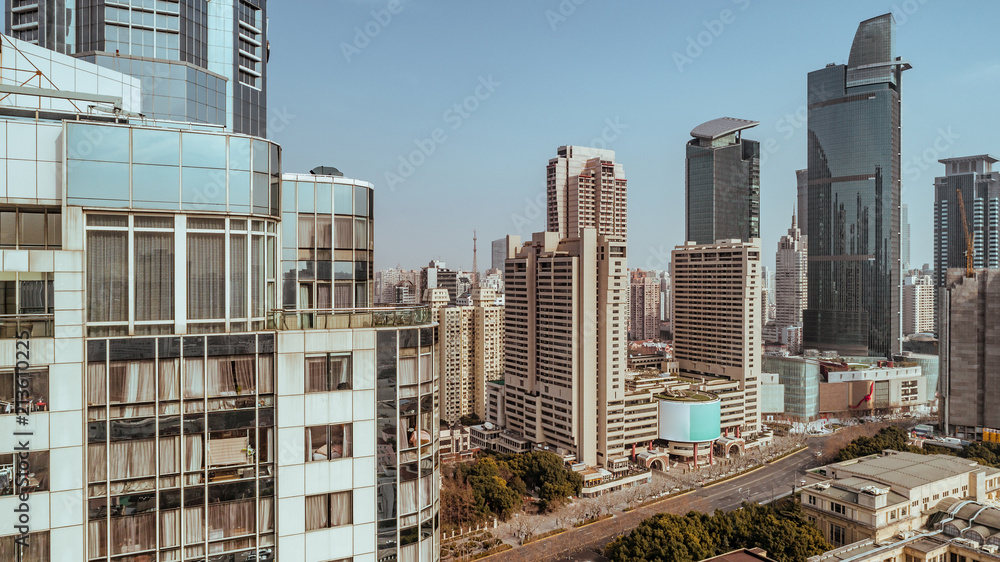 Fototapeta premium Aerial View of business area and cityscape in west Nanjing road, Jing`an district, Shanghai