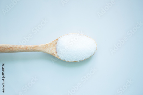 salt white food cooking on spoon and background