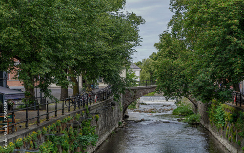 A calm canal with a bridge in Uppsala, Sweden