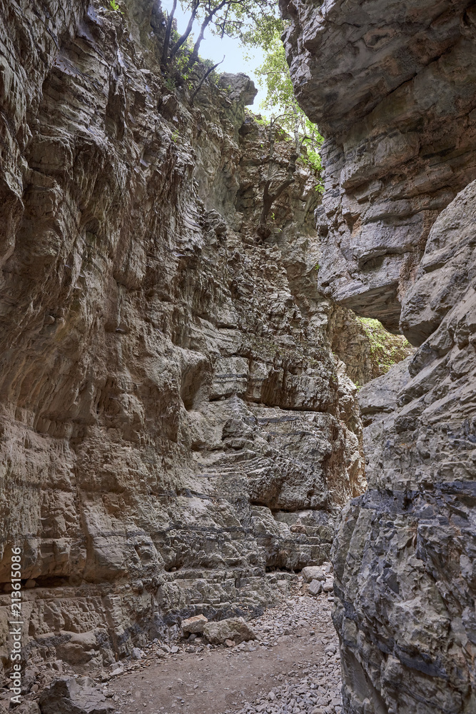 Greece. Crete. The Imbros Gorge. Steep slopes of multi-layered rocks