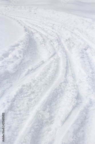 Ski trail tracks in the snow © Delennyk