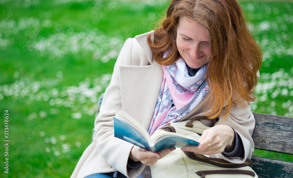 girl reading on a bench girl reading on a bench