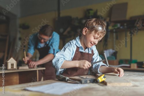 Little boy in the carpentry