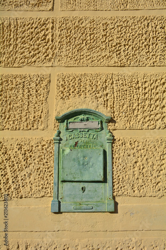 An old postbox in a stone wall in the historic hill village of Casso in Friuli Venezia Giulia, north east Italy
 photo