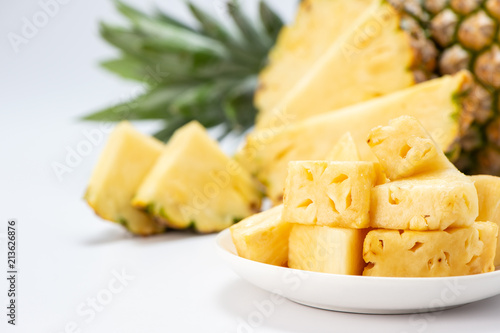 sliced pineapple isolated on white background
