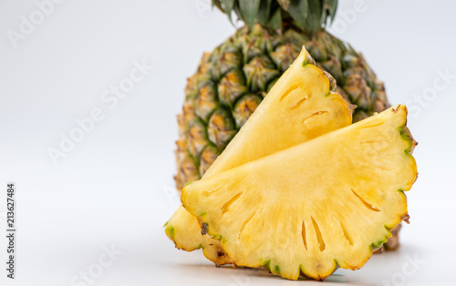 sliced pineapple isolated on white background