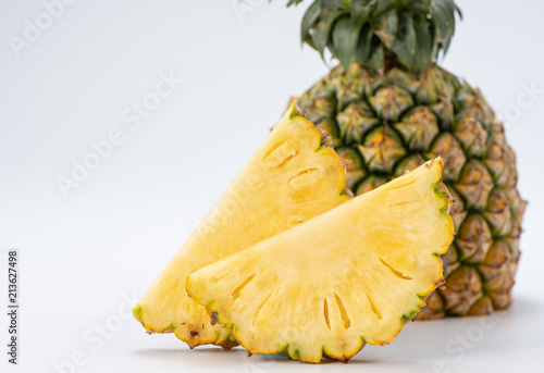 sliced pineapple isolated on white background