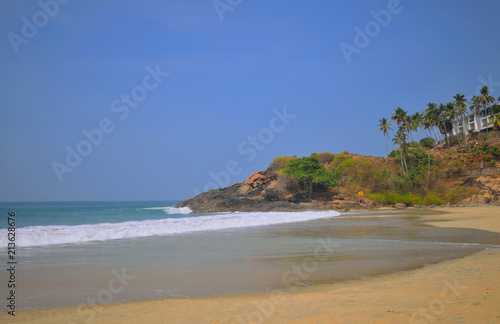 Scenic beauty of kovalam beach with cliff in the background