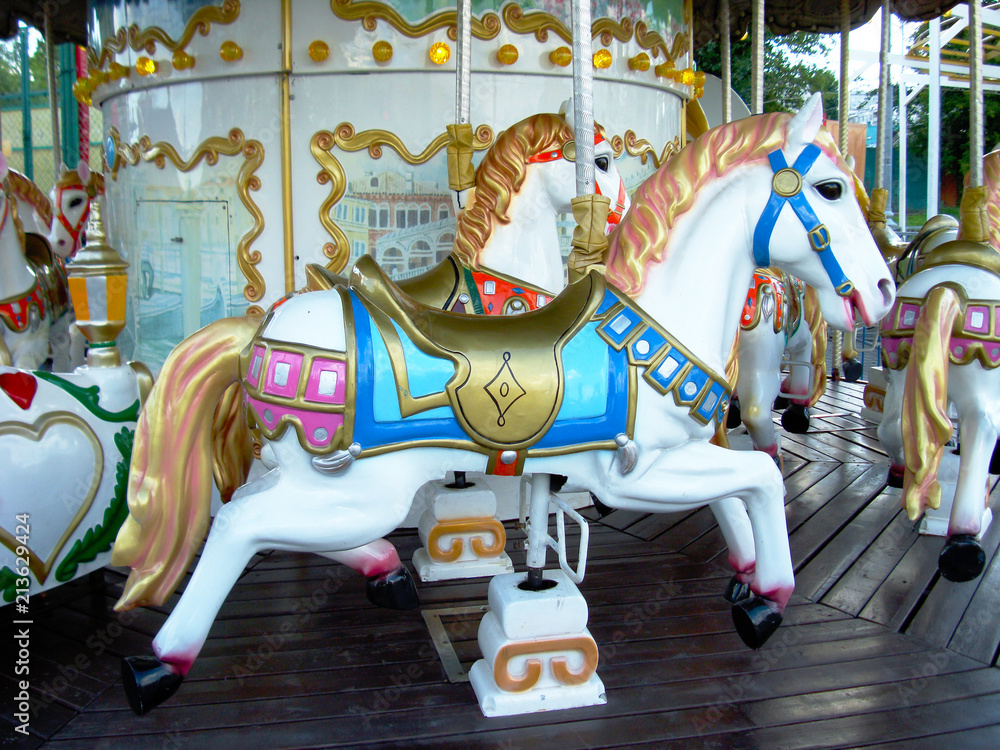 A horse on a vintage carousel.