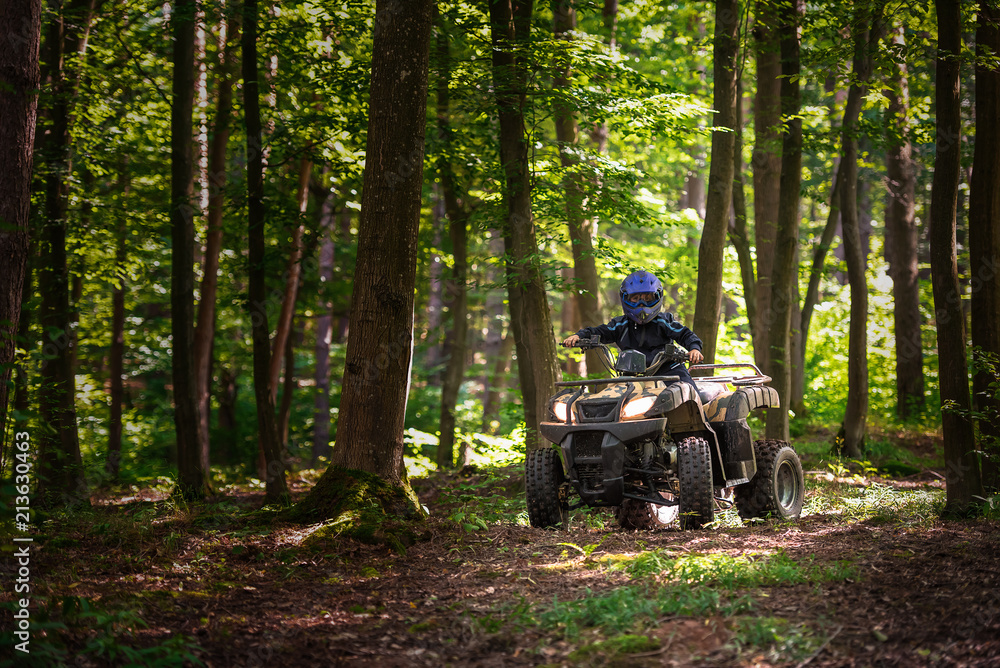 A trip on the ATV on the red road.