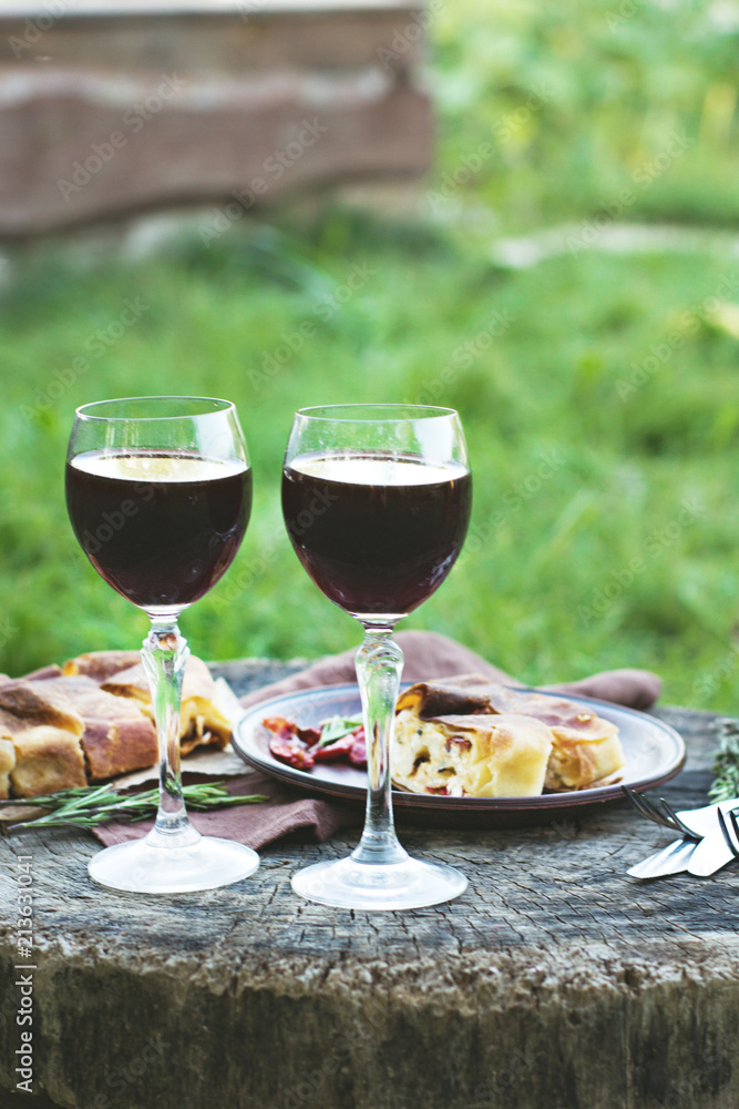 Red wine and light snacks, Grapes, wine, cheese, pie. Red wine and light snacks, Grapes, wine, cheese, pie.