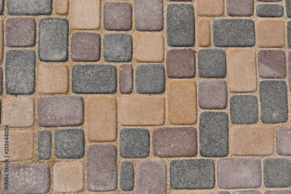 multi-colored tiles paving. top view. multi-colored tiles paving. top view.