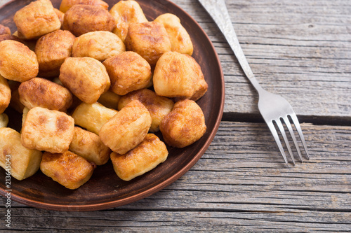 Homemade fried potatoes gnocchi photo