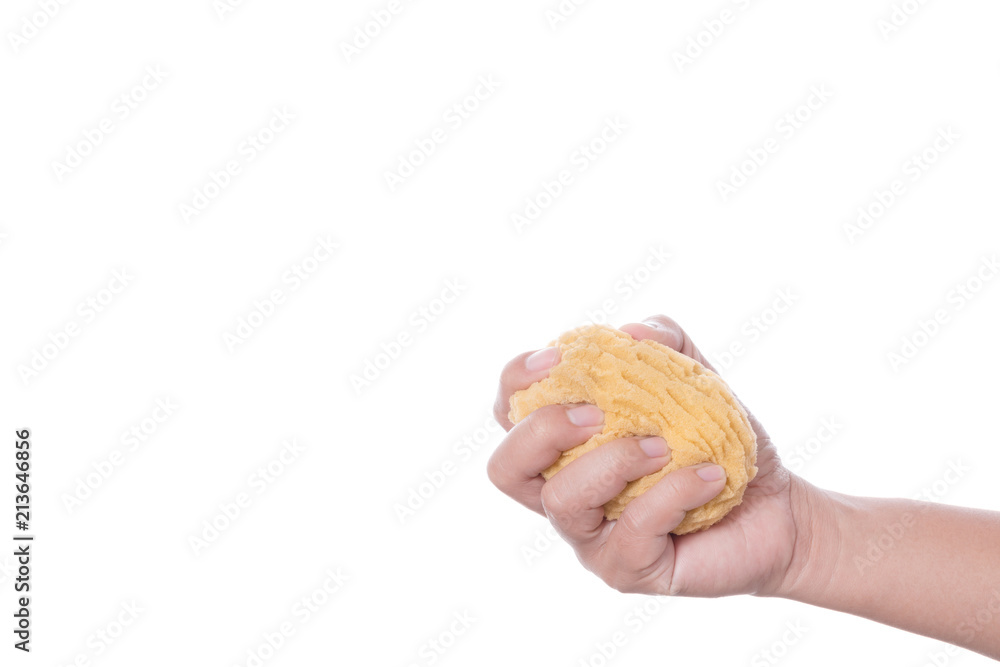 Hand holding synthetic bath sponge for baby shower Hand holding synthetic bath sponge for baby shower