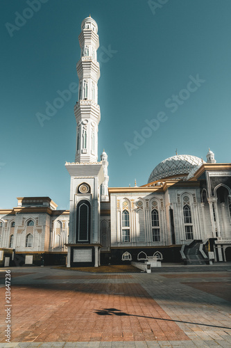 Outside view Mosque Hazrat Sultan in Astana capital of Kazakhstan on a clear day with sun blue sky photo