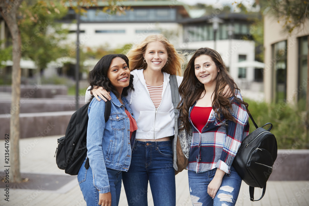 Portrait Of Female High School Students Outside College Buildings