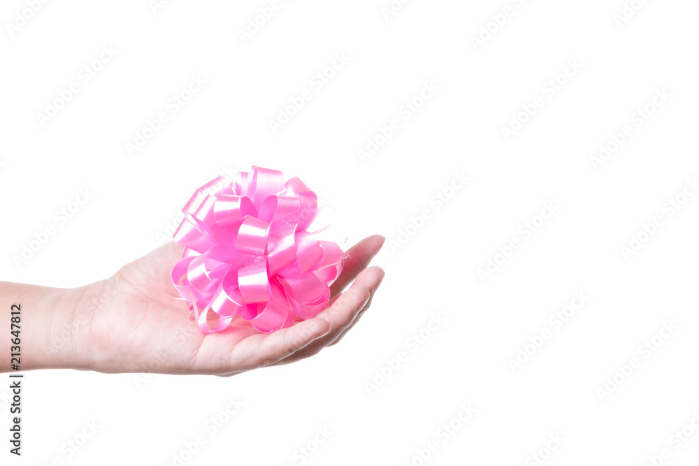 Hand holding pink ribbon for gift decoration Hand holding pink ribbon for gift decoration