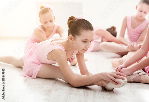 Little ballerinas in ballet studio