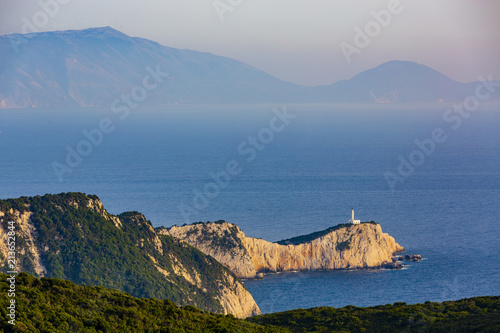 Sunset view with magical lighthouse over Cape of Doukato,  Lefkada island in Ionian Sea, Lefkas, Greece