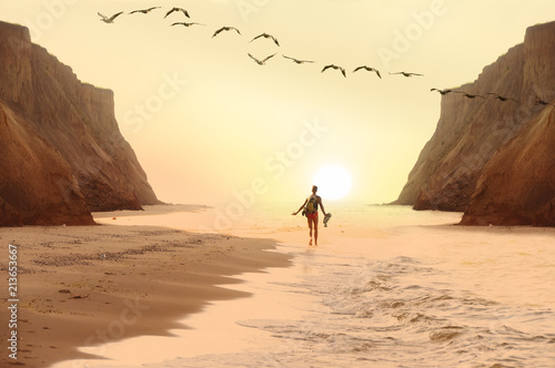 The guy is running on a wild beach. a healthy lifestyle, an atmosphere of happiness and carefree. Selective soft focus. Fantasy. 
