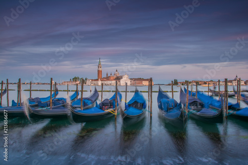 Venetian Gondolas with San Giorgio Maggiore in th ebackground during blue hour  © Christian Schmidt 
