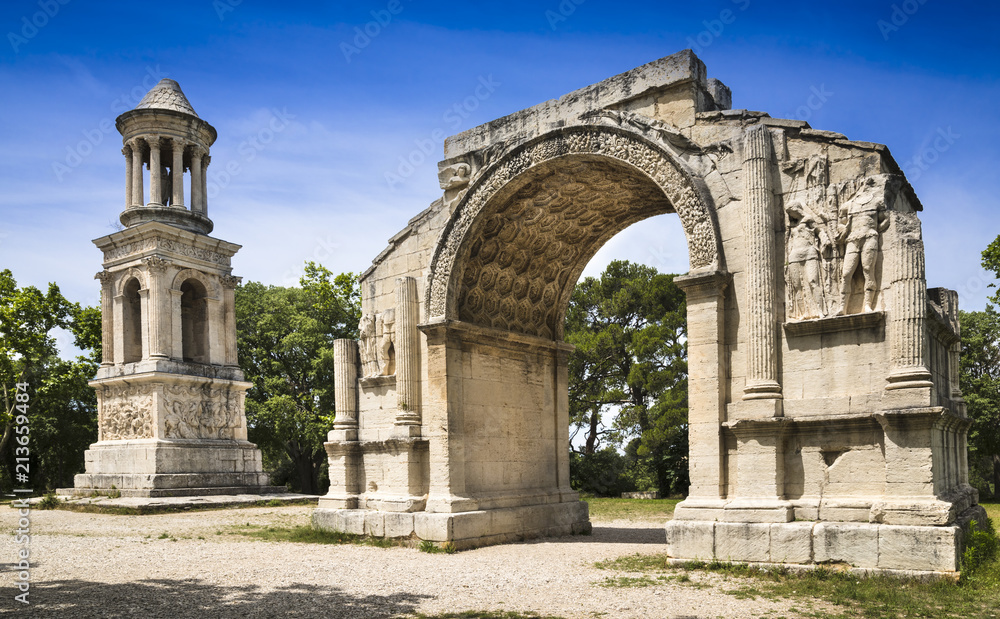Roman Triumphal Arch and Roman Mausoleum of the ancient Glanum. Saint Remy-de-Provence, Bouches-du-Rhone, Provence-Alpes-Cote d‘Azur, France, Europe