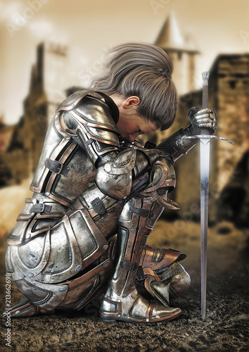 Foto Female warrior knight kneeling wearing decorative metal armor with a castle in the background