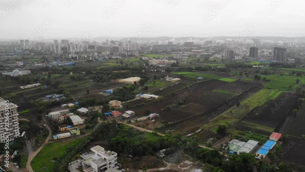 Aerial panoramic view of cityscape of modern industrial city of Pune during monsoon season - Maharashtra, landscape panorama of India, Asia from above Aerial panoramic view of cityscape of modern industrial city of Pune during monsoon season - Maharashtra, landscape panorama of India, Asia from above
