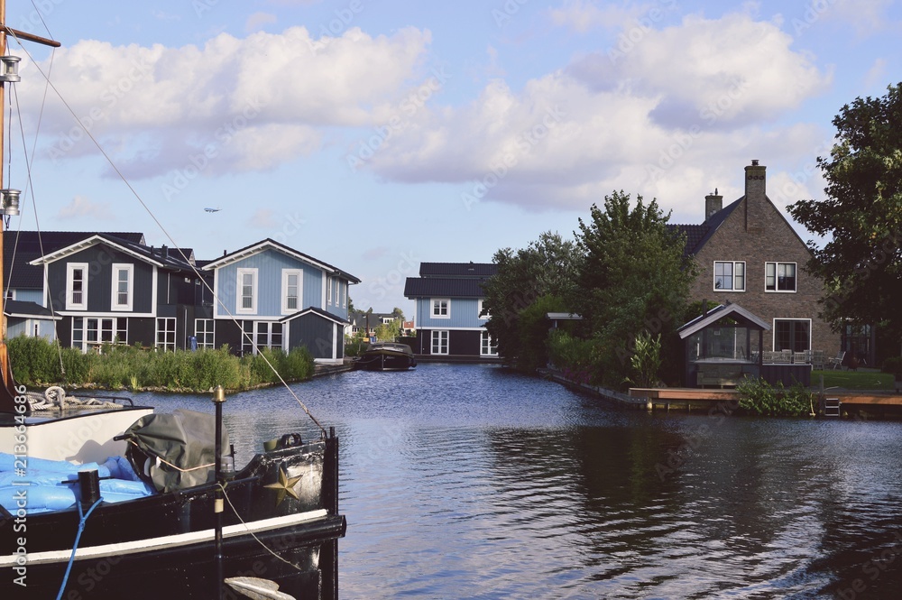 Obraz premium house, water, architecture, home, building, lake, sky, city, river, travel, blue, houses, landscape, sea, village, summer, town, construction, tree, tourism