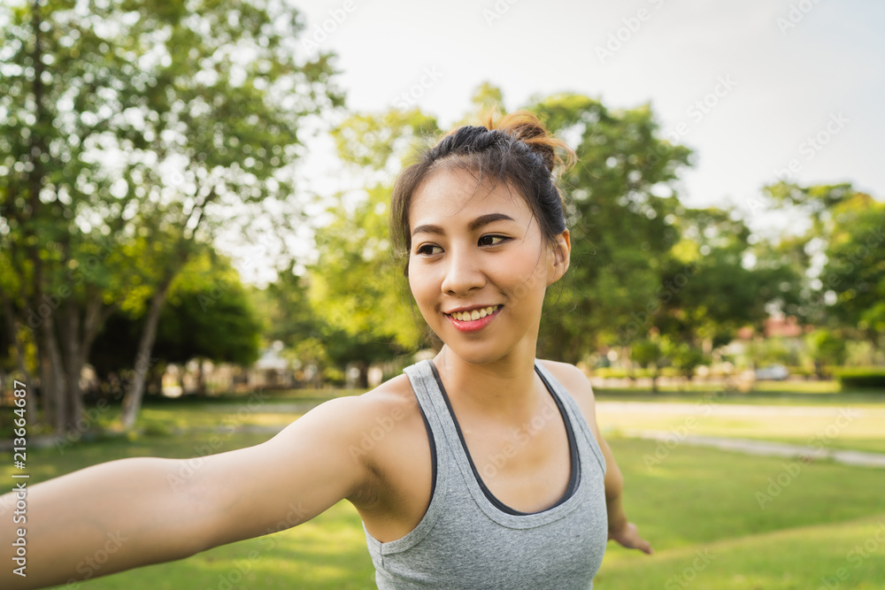 Young asian woman yoga outdoors keep calm and meditates while practicing yoga to explore the inner peace. Yoga and meditation have good benefits for health. Yoga Sport and Healthy lifestyle concept. Young asian woman yoga outdoors keep calm and meditates while practicing yoga to explore the inner peace. Yoga and meditation have good benefits for health. Yoga Sport and Healthy lifestyle concept.