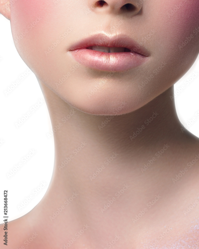The beautiful fashionable young woman with creative cosmetics on a face. Red full lips on a blue background. Bright red cosmetics on a face, hands. Long neck and brilliant skin. Cosmetology
The beautiful fashionable young woman with creative cosmetics on a face. Red full lips on a blue background. Bright red cosmetics on a face, hands. Long neck and brilliant skin. Cosmetology