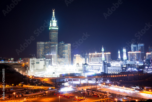 MECCA, SAUDI ARABIA - MAY 05 2018: Amazing night long exposure view on Abraj Al Bait or Clock Tower and Masjid Al Haram mosque in Mecca. Panoramic view on the entire city center from a hill
