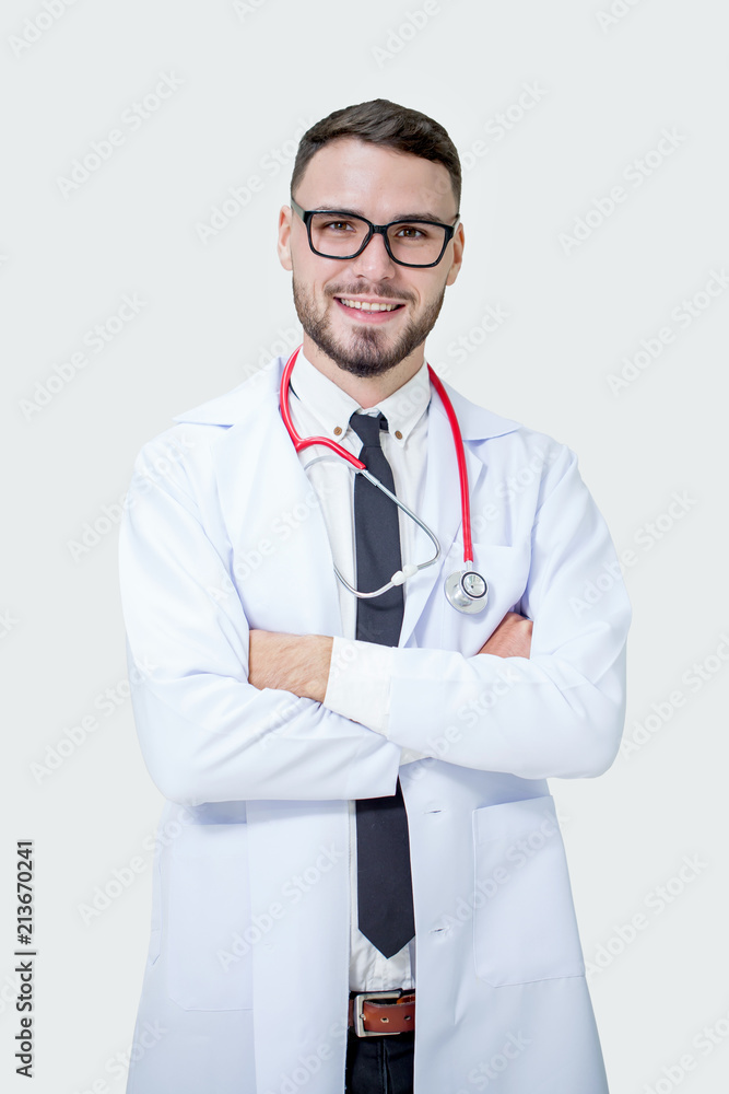 Happy Handsome smiling medical young doctor with stethoscope on white background with clipping path Happy Handsome smiling medical young doctor with stethoscope on white background with clipping path