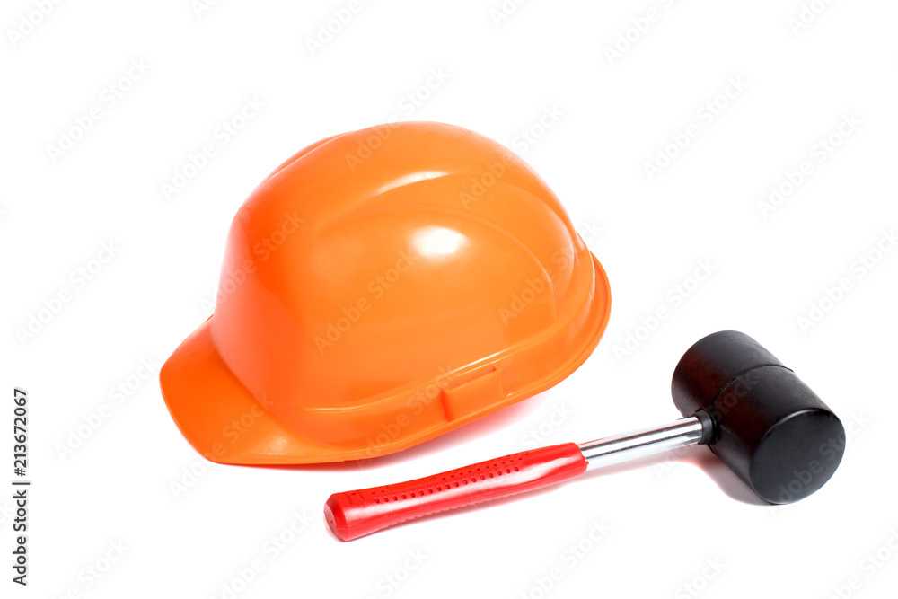 building orange helmet and hammer on white background building orange helmet and hammer on white background