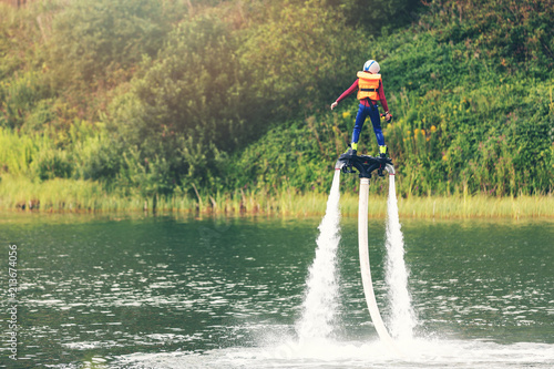 child on flyboard hover in the air