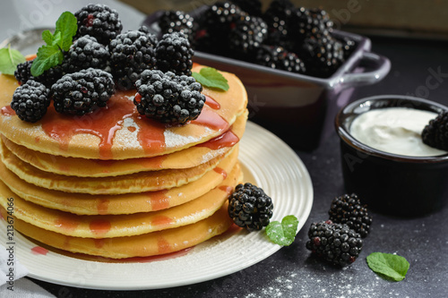 Pancakes with blackberries.