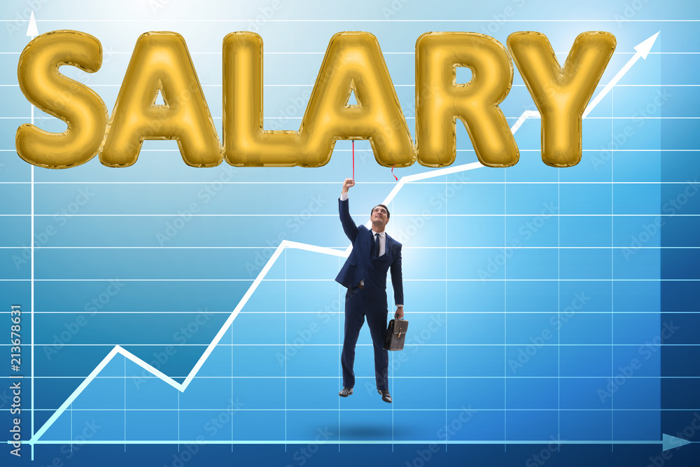 Fototapeta premium Businessman flying in salary concept