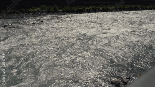 Mountain clean river. Cold fast river slow motion video photo